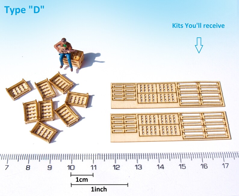 May include: A set of wooden crate kits for model building. The kit includes 10 small crates and 2 large crates. The crates are made of unfinished wood and are approximately 1 inch in size.