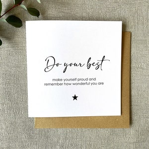 May include: White card with black text that reads "Do your best make yourself proud and remember how wonderful you are" with a black star below the text.