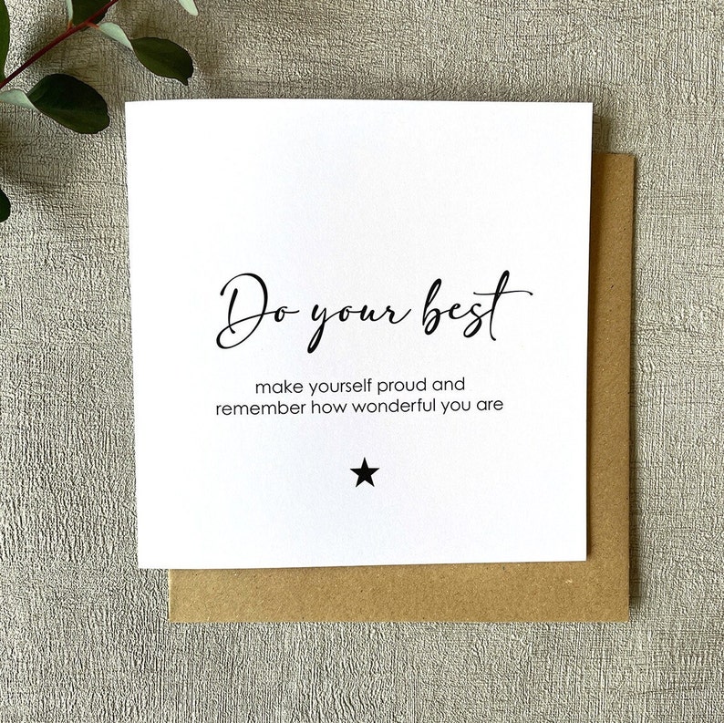 May include: White card with black text that reads "Do your best make yourself proud and remember how wonderful you are" with a black star below the text.
