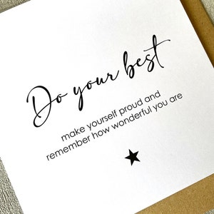 May include: White card with black text that reads "Do your best make yourself proud and remember how wonderful you are". A black star is at the bottom of the card.