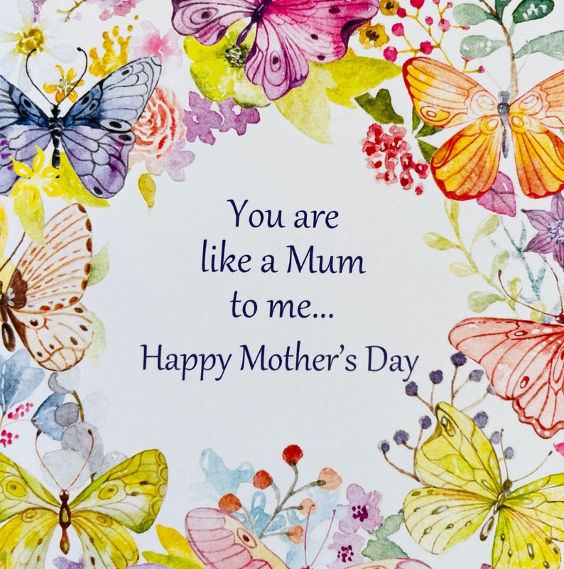 May include: A white card with a watercolor floral border and the text "You are like a Mum to me... Happy Mother's Day".