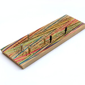 Planche à roulettes ZigZag pour cribbage