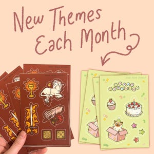 May include: Two sets of sticker sheets with the text New Themes Each Month. One set is dark brown with a unicorn, sword, goblet, gauntlet, and rose. The other set is light green with a Happy Birthday sign, cake, cupcake, and a cat in a box.