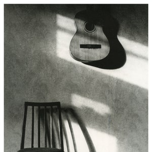 Guitar & chair 2002 silver gelatin print 8x10 inches silver untoned 8x10 inches