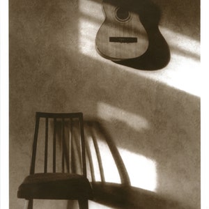 Guitar & chair 2002 silver gelatin print 8x10 inches silver sepia 8x10 inches