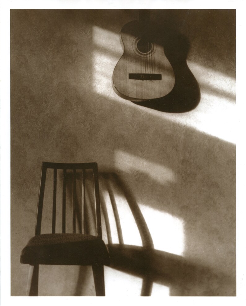 Guitar & chair 2002 silver gelatin print 8x10 inches silver sepia 8x10 inches