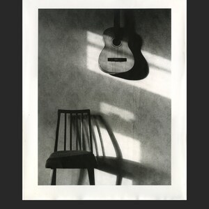 Guitar & chair 2002 silver gelatin print 8x10 inches silver untoned 11x14 inches