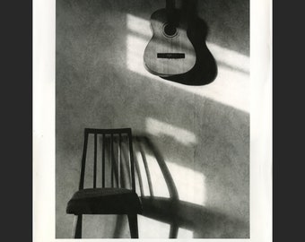 Guitar & chair (2002)  silver gelatin print 8x10 inches
