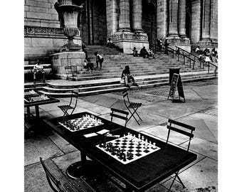Chess tables are waiting for players. New York. 2003. Black and white print 8.5x11 inches