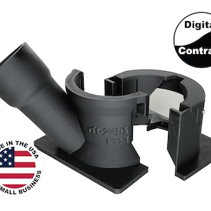 Pu&ograve; includere: Dispositivo in plastica nera con tubo angolato e sezioni curve, etichettato "ff-2401 Fest". Include un logo "Digital Contrast" e un adesivo "Made in the USA by a Small Business".