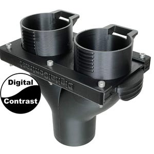 May include: A black 3D-printed object with two cylindrical cup holders and a funnel-shaped base. The object has the text "Digital Contrast" on its side and is secured with small screws. The cup holders have measurement markings.