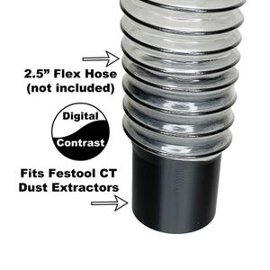 May include: A black and white logo for Digital Contrast, a brand of dust extraction equipment. The logo is on a clear plastic hose with a black ring around the top. The hose is 6.35 cm in diameter and fits Festool CT dust extractors.