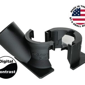 Pu&ograve; includere: Componente in plastica nera con un design curvo e angolato. Il testo "fft-2401 2.5" &egrave; visibile. L'immagine include una grafica "Made in the USA by a small business" e un logo "Digital Contrast".