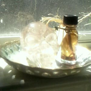 High John Conqueror Oil by Crushing up real High John Root with oil 1/2 fl oz