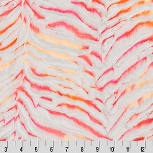 May include: White faux fur fabric with a pink and orange striped pattern. The fabric is soft and fluffy, and it would be perfect for making blankets, pillows, or other home decor items.