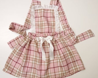 Vestido estilo pichi de tartán rosa para niña con encaje