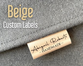 Beige logo-labels, aangepaste beige satijnen naai-ambachtelijke show-tags