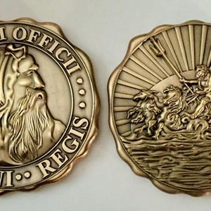 May include: A gold-colored coin with a raised image of a bearded man on one side and a scene of a man riding a seahorse on the other. The text "SIGILLUM OFFICII NEPTUNI REGIS" is inscribed around the edge of the coin.