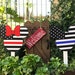 Stephi Marie reviewed Disney inspired blue and red lives matter yard decorations! Fire fighter minnie and police officer mickey