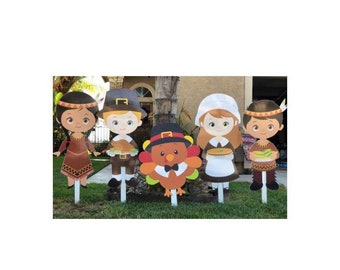 Thanksgiving pilgrams and indians yard cutout decorations