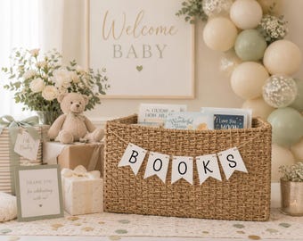 May include: A rectangular woven seagrass basket filled with children's books, featuring a white pennant banner with the black text "BOOKS" draped across the front. The basket is surrounded by gift boxes, a teddy bear, and floral arrangements.