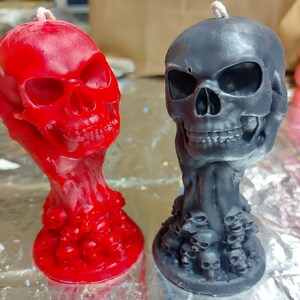 Skull in hand candle
