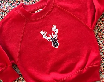 Children's red Christmas jumper with a tartan stag 1-12 years
