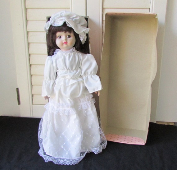 wind up porcelain doll