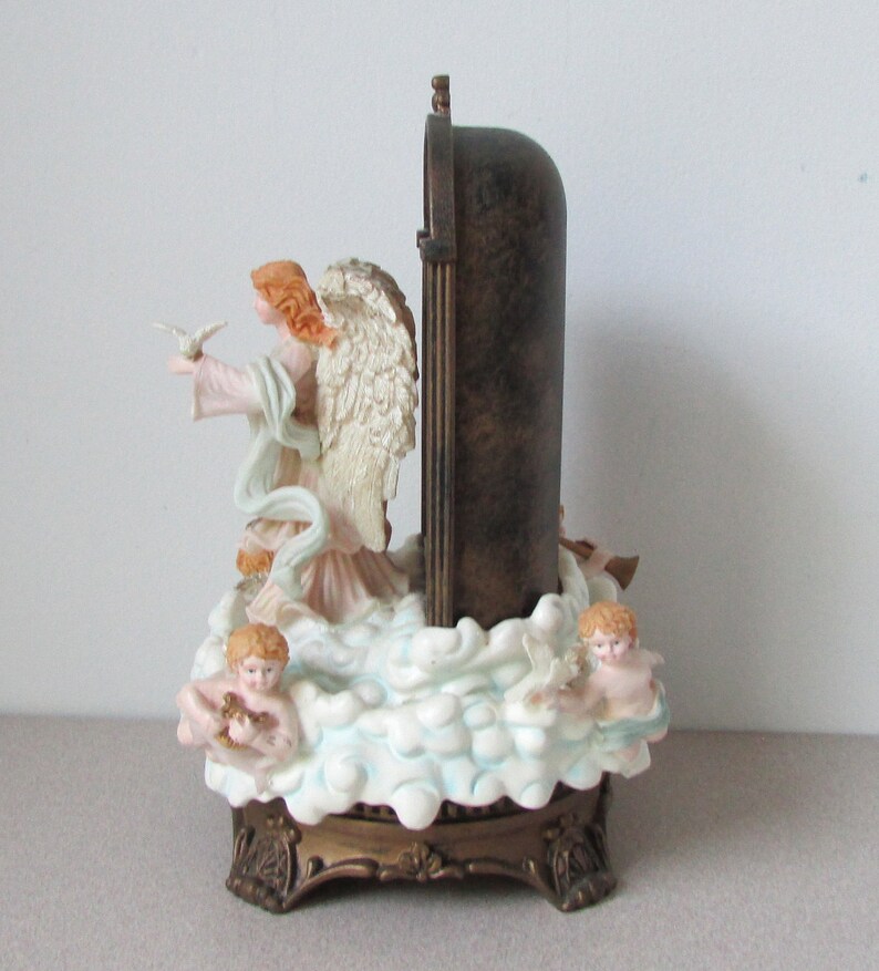 Avon Angel With Cherubs Lighted Angel Music Box Avon Music Etsy