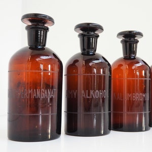 Set of 4 brown pharmacy glass jars - vintage storage from the 1950s