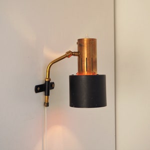 Rare brass and black wall light - Danish design lighting from the 1950s attributed to Holm Sørensen