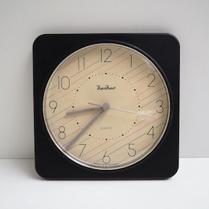 Memphis style plastic wall clock made by company Hanhart - German vintage design from the 1980s
