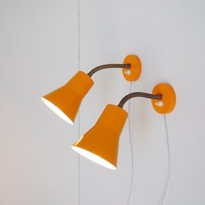 Great pair of yellow sconces from company Hamalux- Danish design from the 1970s
