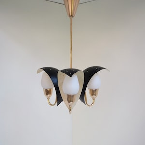 Charming chandelier with 3 black shades with star perforation and opal glass shades from Danish Fog & Morup, 1950s