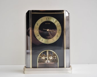 Amazing postmodern desk clock with spinning motion by Rhythm quartz - Japanese vintage design from the 1990s