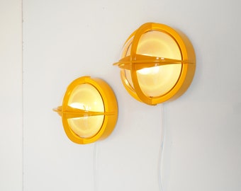 Cool pair of yellow Pirat wall lamps from Nordisk Solar, Danish design from the 1980s