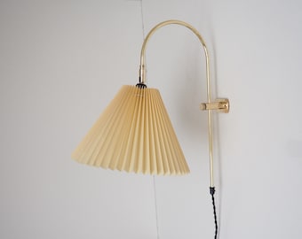 Stunning brass wall lamp with yellow shade - Danish vintage design made during the 1960s