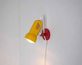Starlet wall lamp in bright red and yellow from the Danish company Horn, 1980s