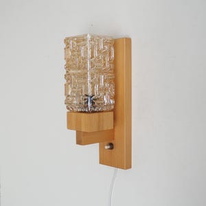 Vitrika sconce made in beechwood with decorative square glass shade, Danish design from the 1980s