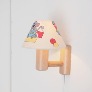 Beechwood wall lamp with nice matching fabric shade - Danish design from Dana Light, 1980s