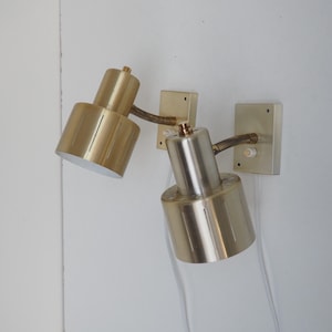 Stylish pair of brass colored sconces from Vitrika - Danish vintage design from the 1960s