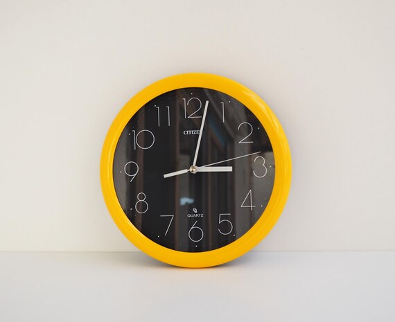 Vintage Citizen Wall Clock: Yellow & Black Plastic, 1980s Design