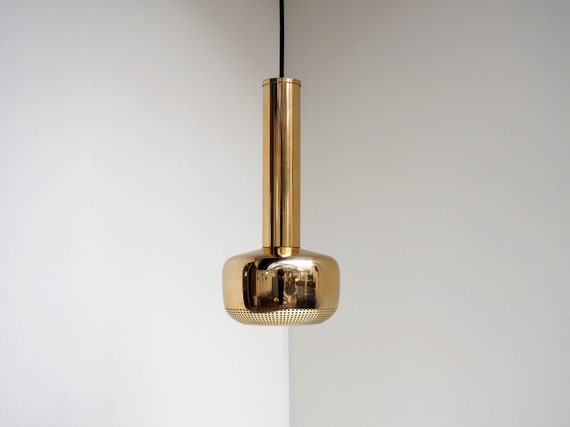 Guldpendel designed by Vilhelm Lauritzen for Louis Poulsen in the 1950s Danish iconic design Guldpendel designed by Vilhelm Lauritzen for Louis Poulsen in the 1950s Danish iconic design