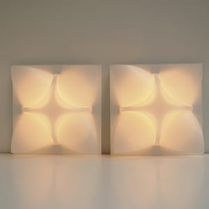 Beautiful set of Le Klint wall lamps model 215 - Danish lighting design from 2006