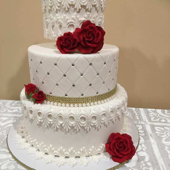 Sugar roses and gold leaf for an anniversary cake today. : r/Baking