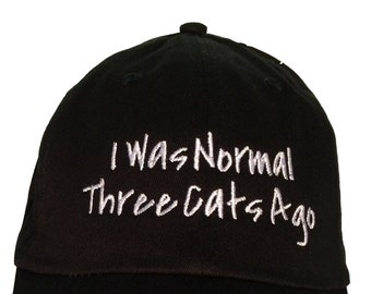 I Was Normal Three Cats Ago - Polo Style Ball Cap (Black with White Stitching)