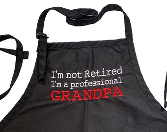 I'm not Retired, I a professional Grandpa (Adult Apron) Available in Colors too.