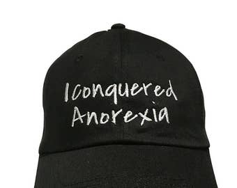 I Conuered Anorexia - Polo Style Ball Cap (Black with White Stitching)