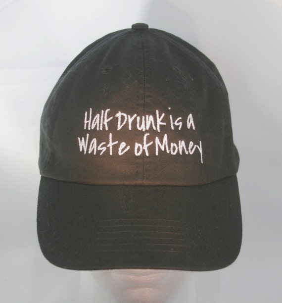 Half Drunk is a Waste of Money - Polo Style Ball Cap (Black with White Stitching)