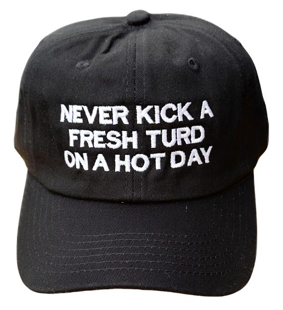 Never Kick a Fresh Turd -  Ball Cap (Various Colors with White Stitching)
